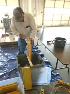 Dennis Chandler Extracting Honey